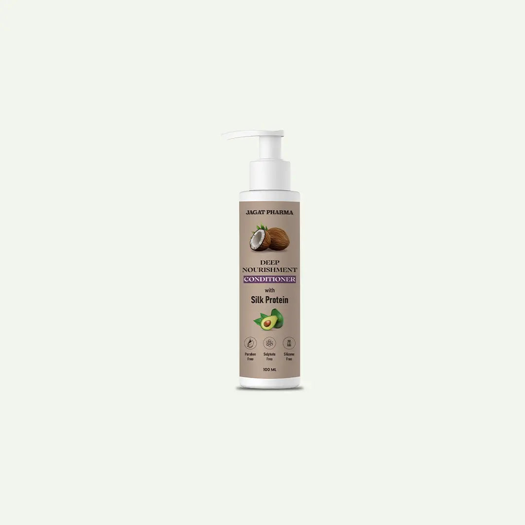 A bottle of Jagat Pharma Deep Moisturizing Conditioner, Silk Protein variant, with a white pump dispenser and a beige label, centered on a light off-white background.