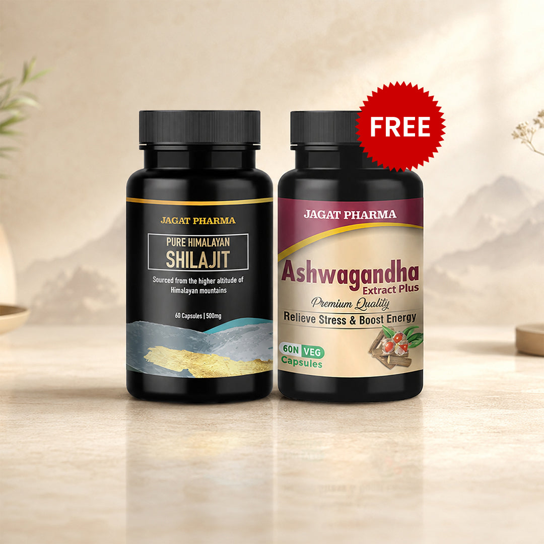 Two black supplement bottles from Jagat Pharma on a beige surface with a soft blurred background. The left bottle is Pure Himalayan Shilajit, and the right bottle is Ashwagandha Extract Plus, with a red 'FREE' burst sticker near the top right.