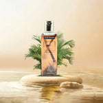 A bottle of Jagat Pharma Hair Oil stands on a small stone platform in shallow water, surrounded by green palm leaves against a warm beige background.